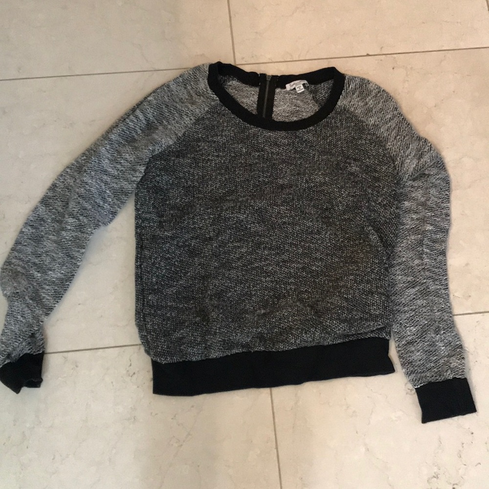 Black and white sweatshirt with half zip in back